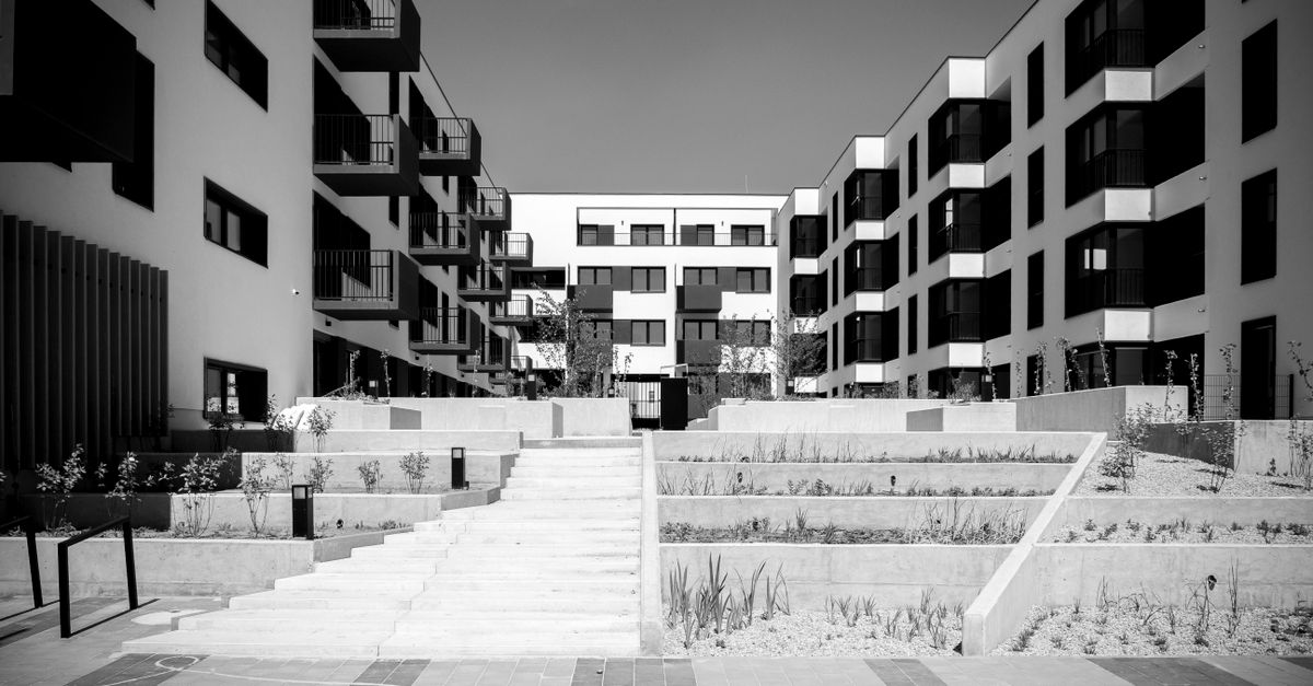 Black and white photo of modern apartment buildings in Wrocław, Poland.